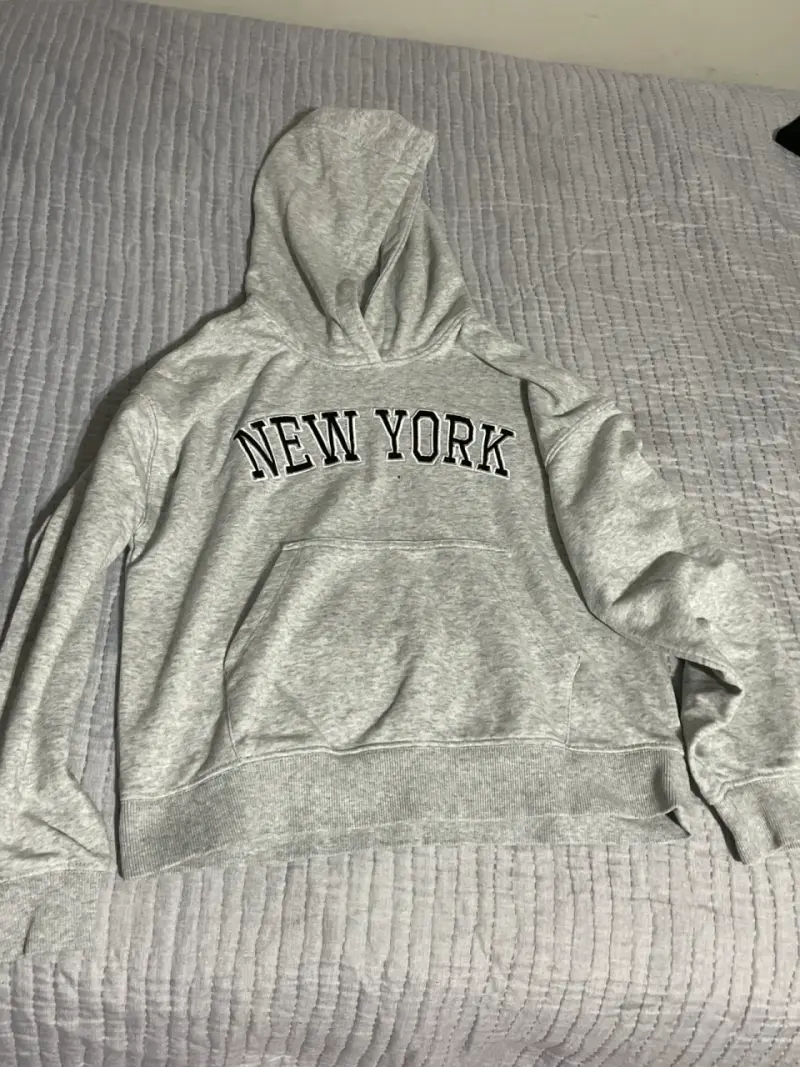 Polerón capucha gris 'New York'
