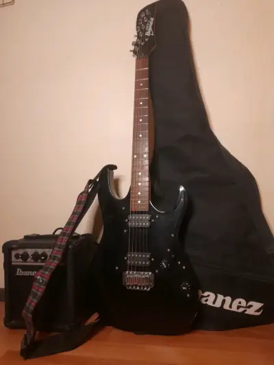 Guitarra eléctrica Ibanez con amplificador - miniatura 1