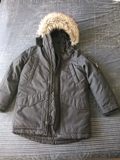 Parka negra con capucha de piel - miniatura 1