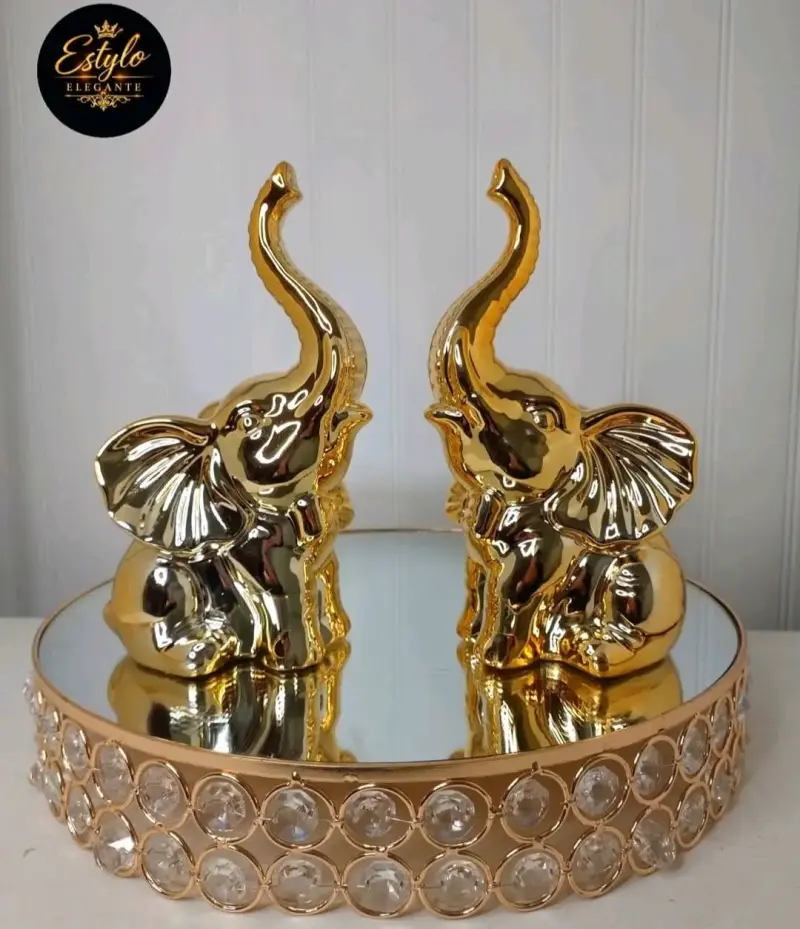 Adornos de elefante dorados