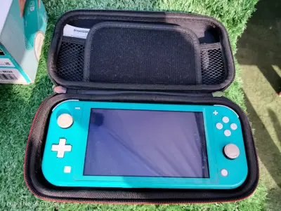 Nintendo Swich azul turquesa - miniatura 1