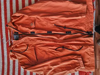 Parka naranja con capucha - miniatura 1