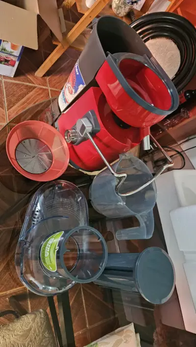 Extractor de jugo Oster rojo - miniatura 5
