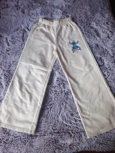 Pantalones beige Stitch niña - miniatura 1