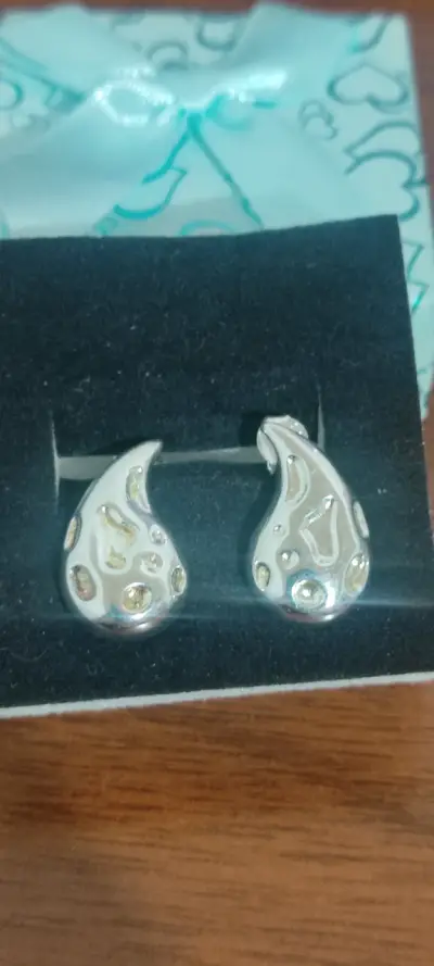 Aros plateados con diseño único - miniatura 1