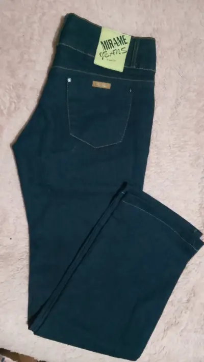 Jeans azul con body encaje verde - miniatura 5
