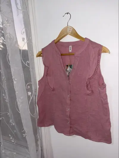 Blusa sin mangas rosa - miniatura 1