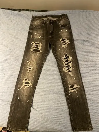 Jeans desgastados para hombre - miniatura 1