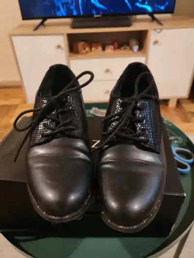Zapatos negros de cuero - miniatura 1