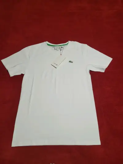Polera blanca con logo - miniatura 1
