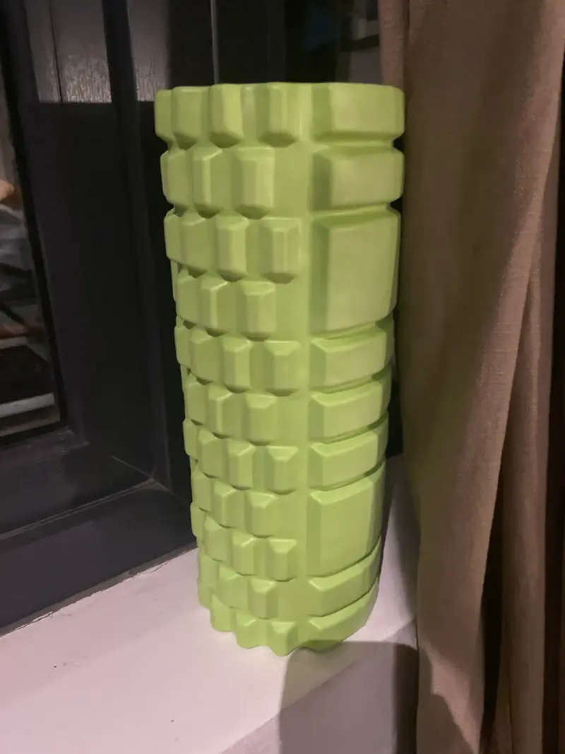 Rodillo de espuma verde para ejercicios
