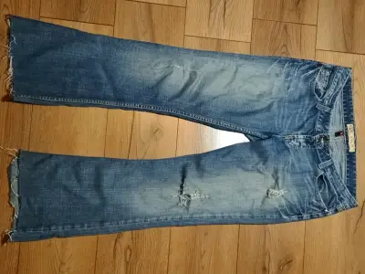 Jeans azul desgastados tiro bajo - miniatura 1