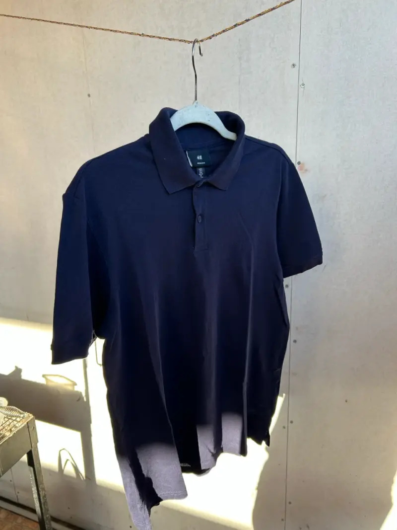 Polera polo azul H&M