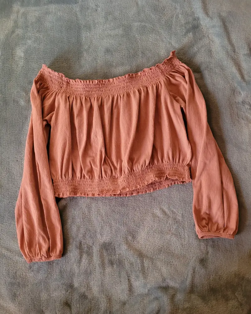 Blusa off-shoulder rosa