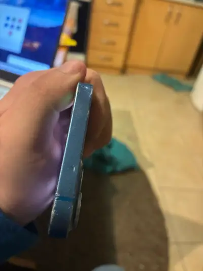 Smartphone azul con cámara dual - miniatura 4
