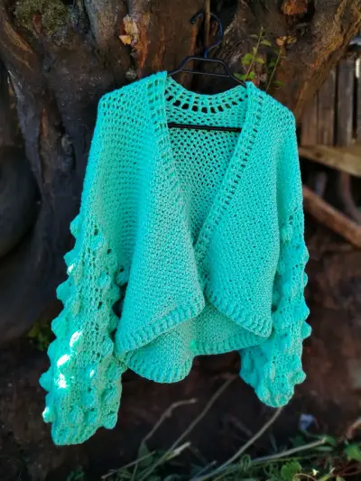 Chaleco verde agua tejido a mano - miniatura 2