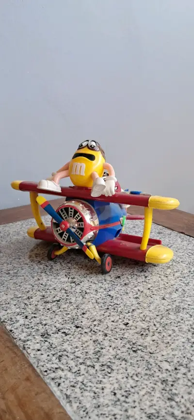 Juguete M&M avión amarillo - miniatura 1