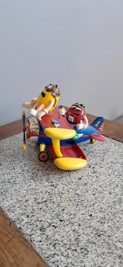 Juguete M&M avión amarillo - miniatura 2