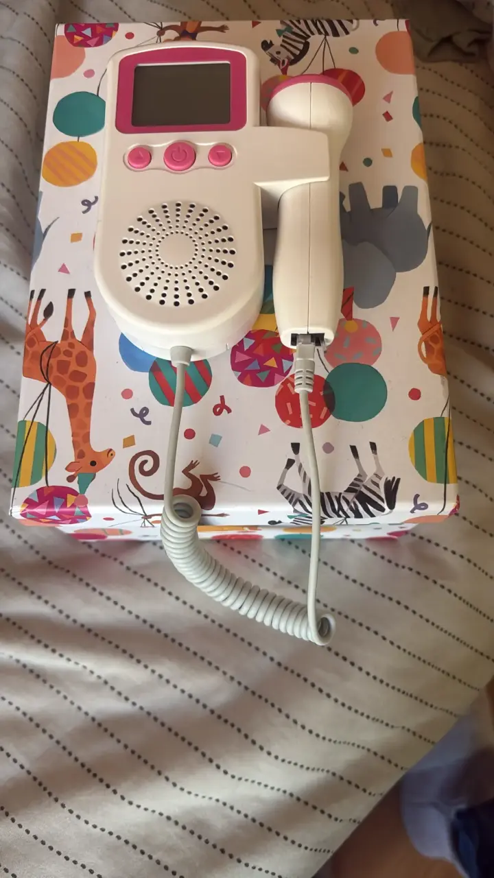 Monitor fetal Doppler blanco y rosado
