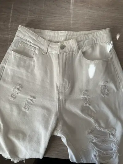 Pantalones blancos rajados - miniatura 1