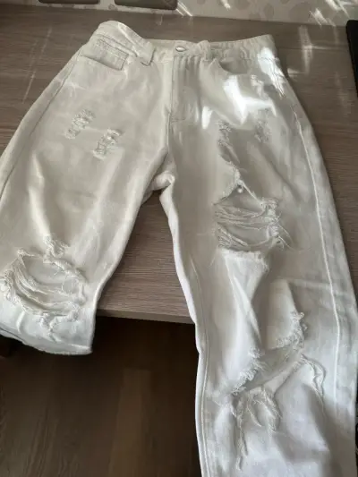 Pantalones blancos rajados - miniatura 3
