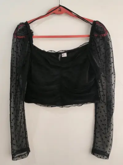 Blusa negra de tul con mangas - miniatura 1