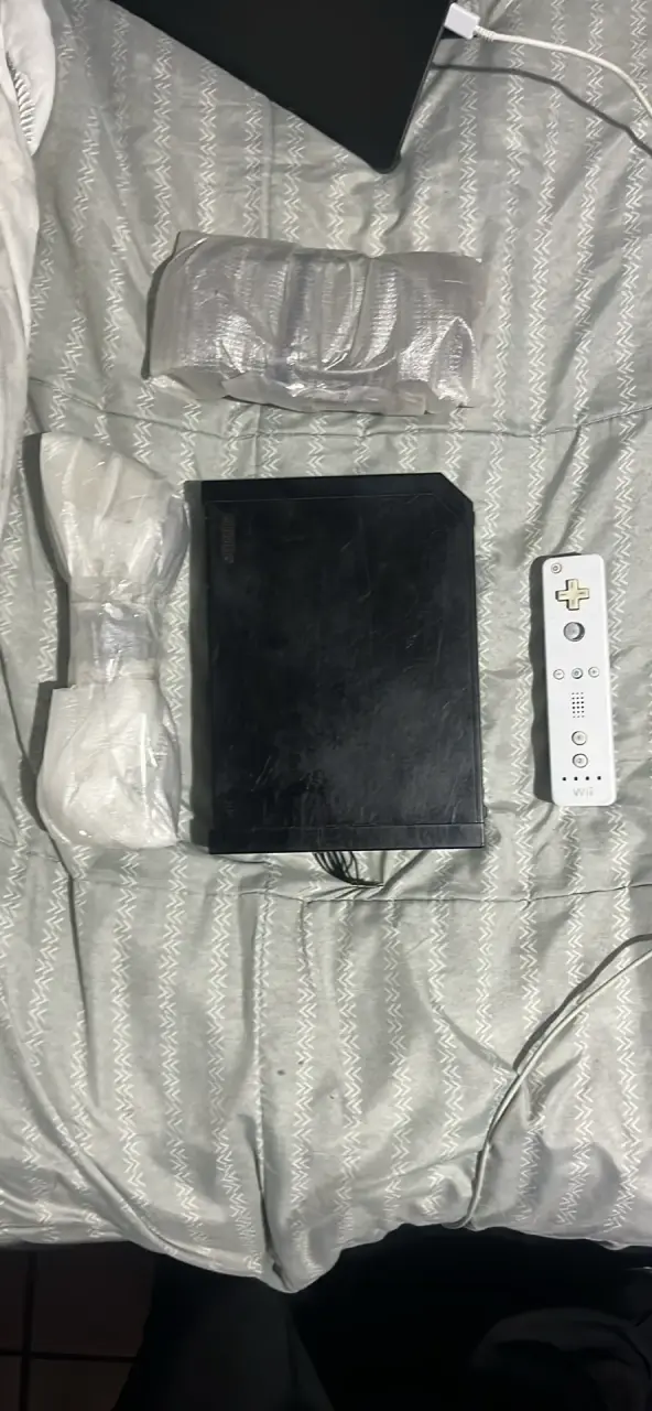 Consola Wii negra con control