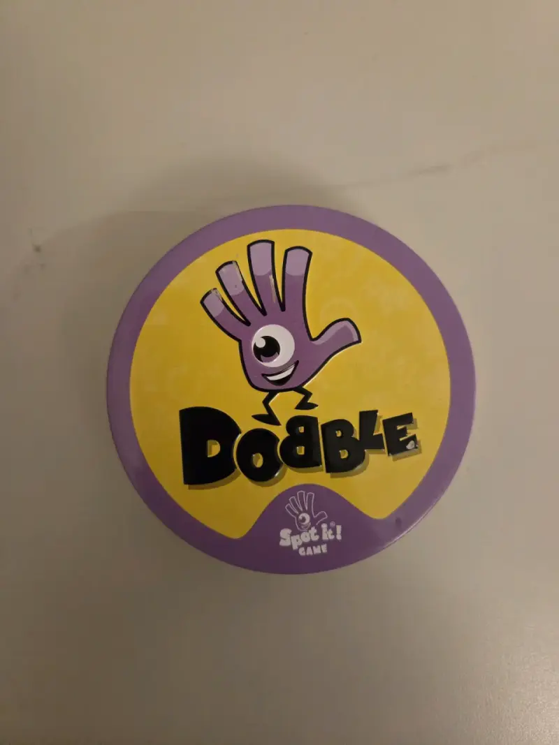Juego Dobble en lata