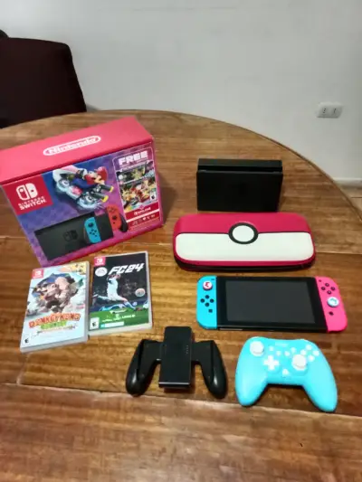 Nintendo Switch con accesorios y juegos - miniatura 1