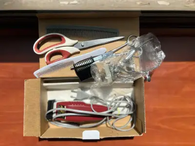 Cortadora de pelo eléctrica roja - miniatura 2