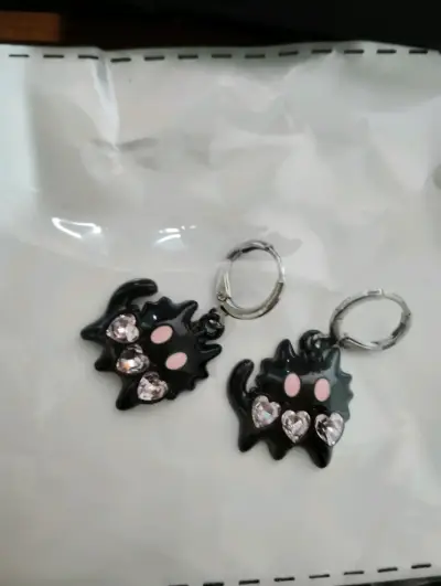 Aretes plateadas de distintos diseños - miniatura 2