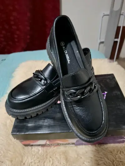Zapatos negros estilo mocasín - miniatura 1