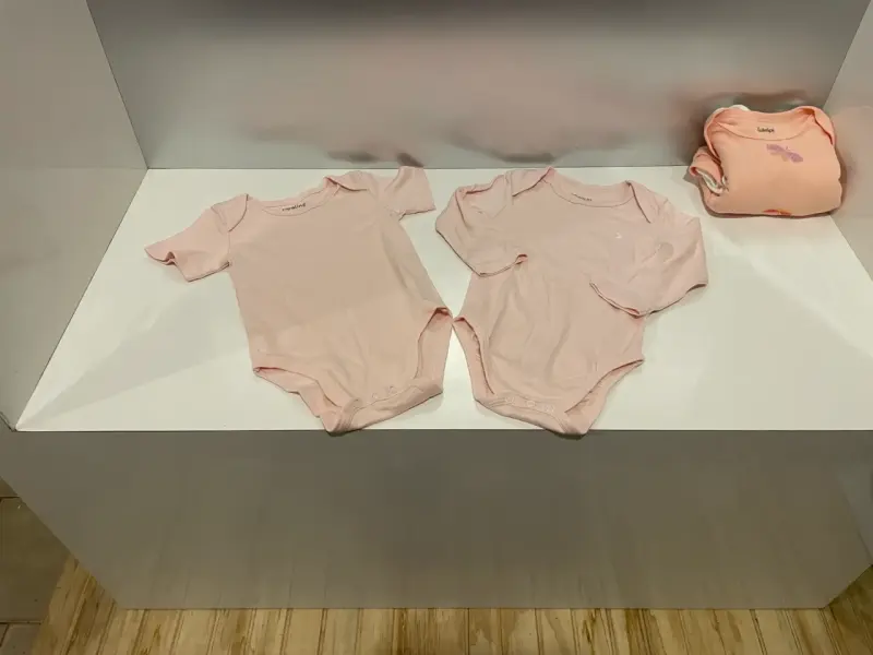 Conjunto de bodys rosados para bebé