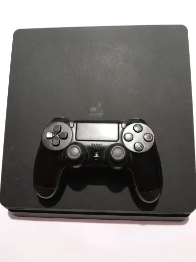 Consola PlayStation Slim con control - miniatura 1
