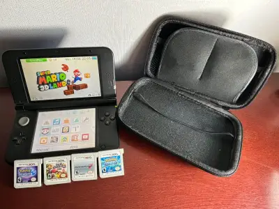 Nintendo 3DS XL con juegos - miniatura 1