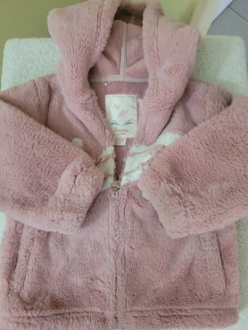 Chaqueta rosada de peluche infantil