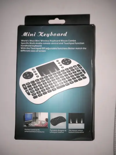 Teclado Mini Inalámbrico con Touchpad - miniatura 1