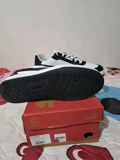 Zapatillas Puma blancas y negras - miniatura 2