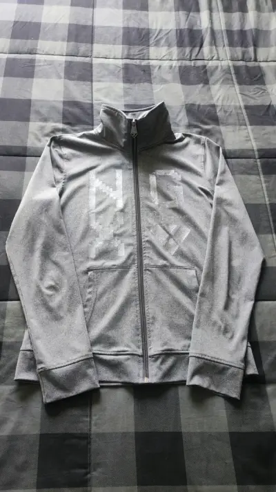 Polerón gris con cierre NGX deportivo - miniatura 1