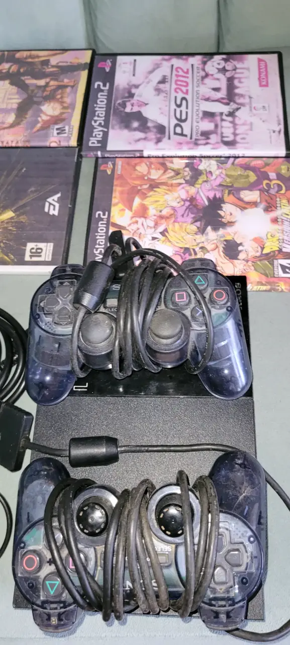Consola PlayStation 2 con juegos