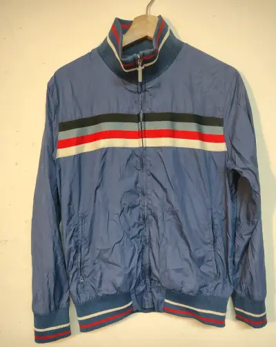 Chaqueta deportiva azul con franjas converse - miniatura 1