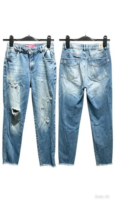 Jeans desgastados celestes - miniatura 1