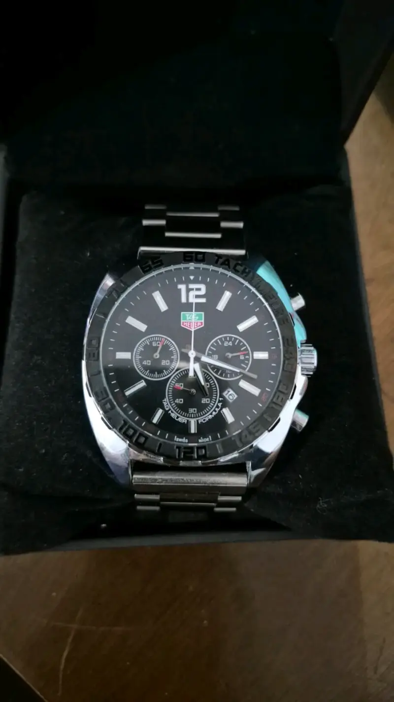 Reloj dorado con esfera azul - 4