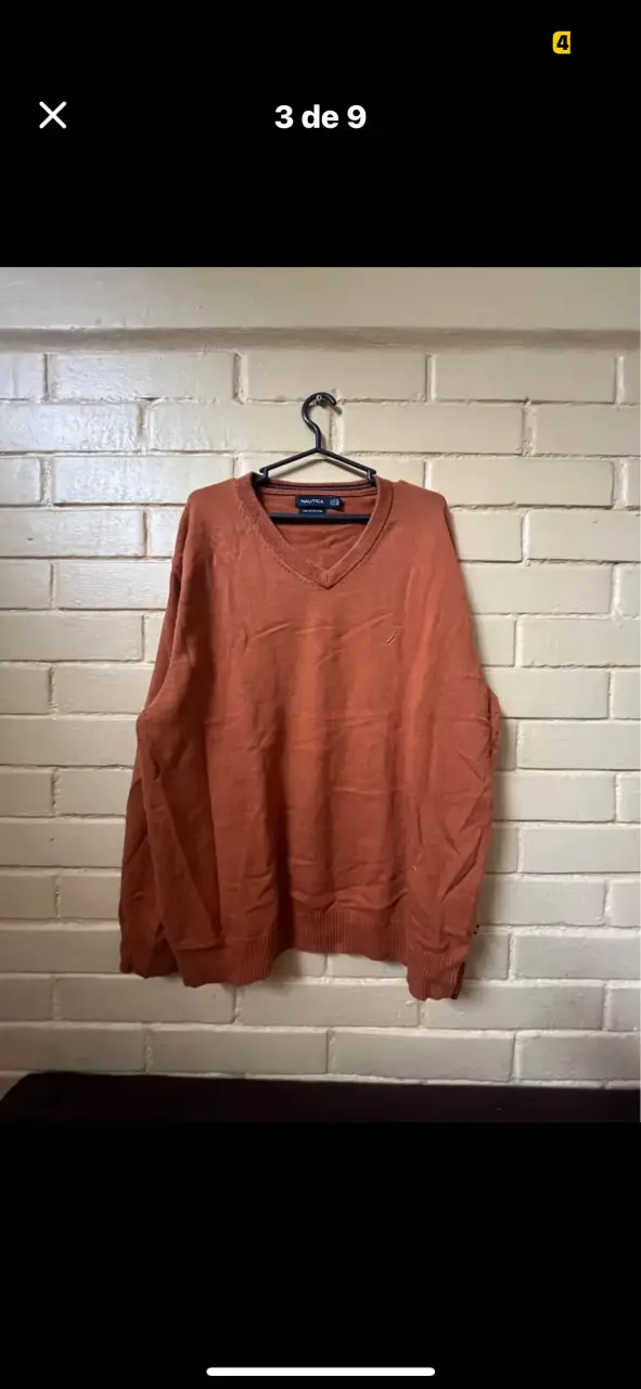 Suéter marca náutica naranja cuello en V