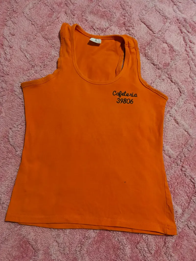 Polera sin mangas naranja estampada - 3