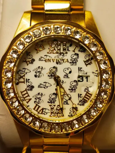 Reloj dorado con diseño Snoopy - miniatura 1