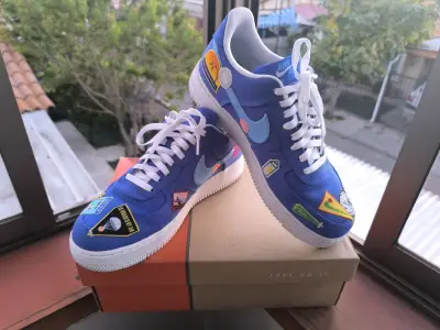 Zapatillas Nike azules con estampados - miniatura 1