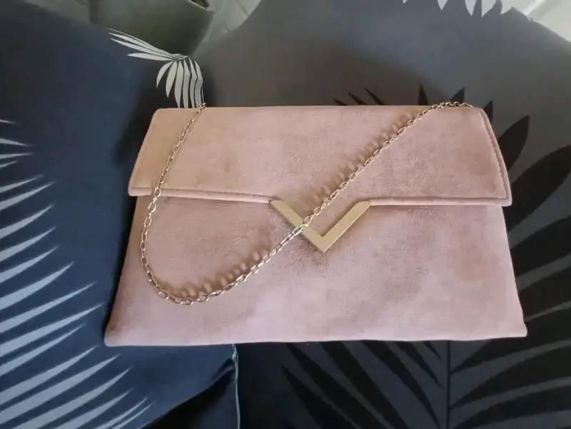 Cartera de mano rosa