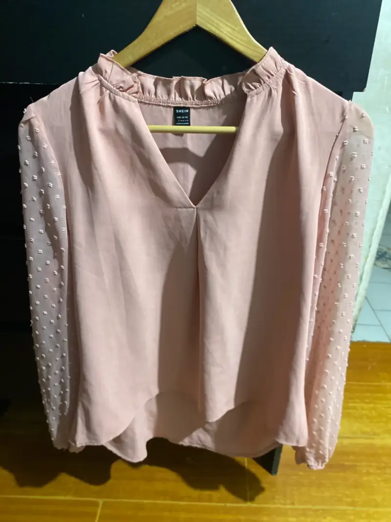 Blusa rosa mangas transparentes
