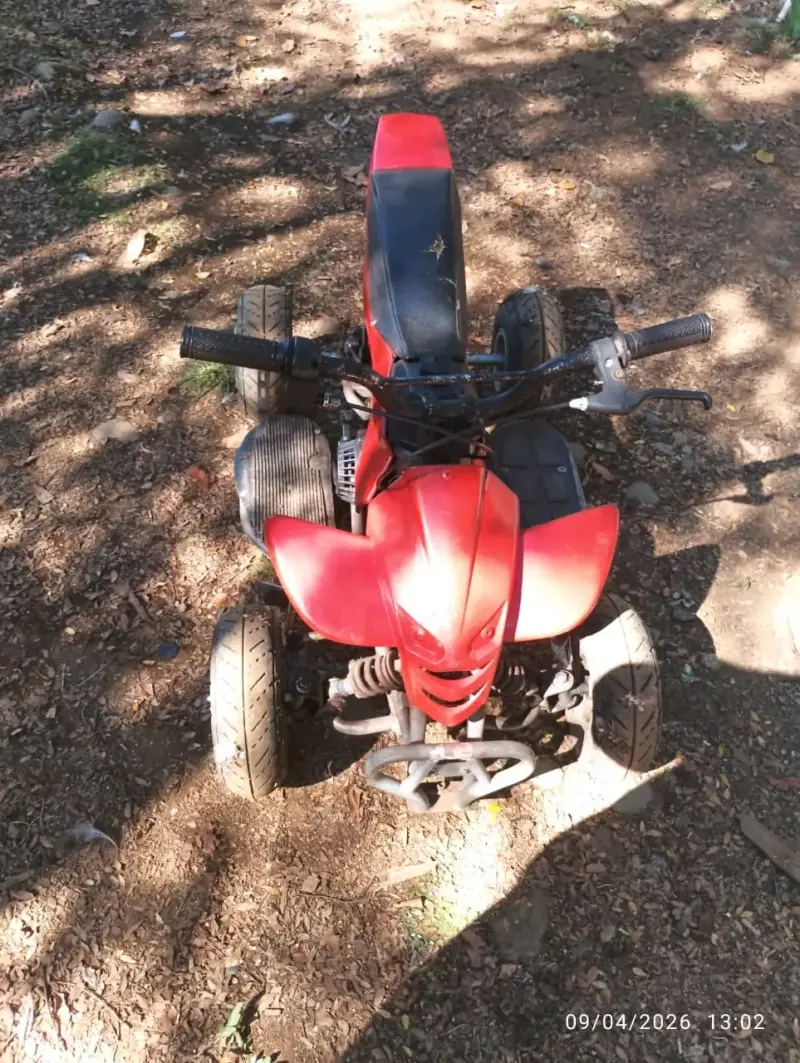 Mini cuatrimoto roja usada - 1
